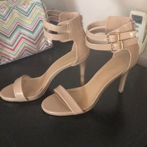 Nude patent heels
